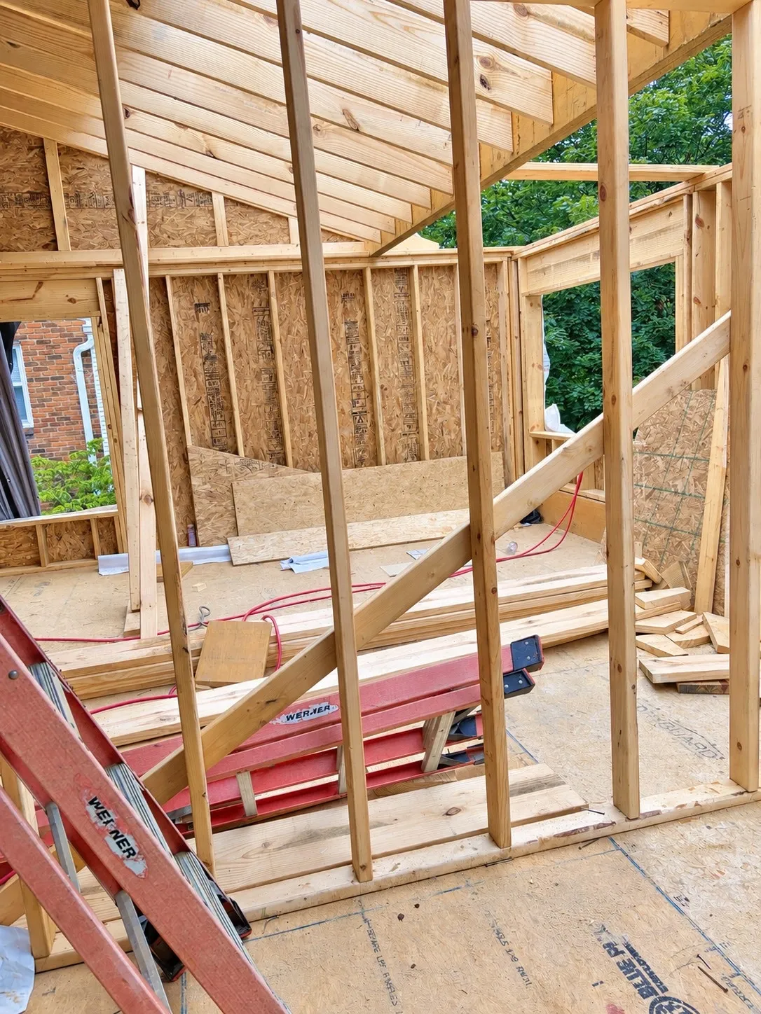 Framing in the new addition, showing the rooms taking shape